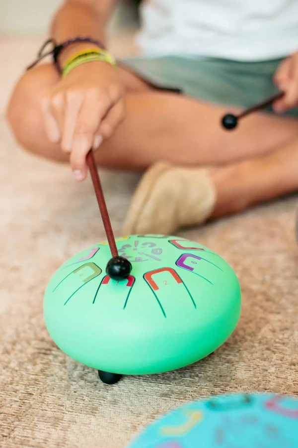 Bębenek językowy Baby Tambu śr. 15cm - Teal Peal / Juegaconmigo