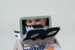 Obracająca się książeczka grzechocząca Tummy Time - Czarno-Biała / Taf Toys