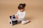 Obracająca się książeczka grzechocząca Tummy Time - Czarno-Biała / Taf Toys