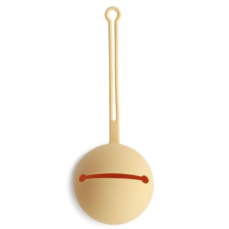 Etui na smoczek Kula Ball Pale Daffodil / Mushie