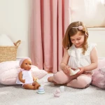 Lalka niemowlę ze smoczkiem, w dwuczęściowym ubranku i opasce / LullaBaby