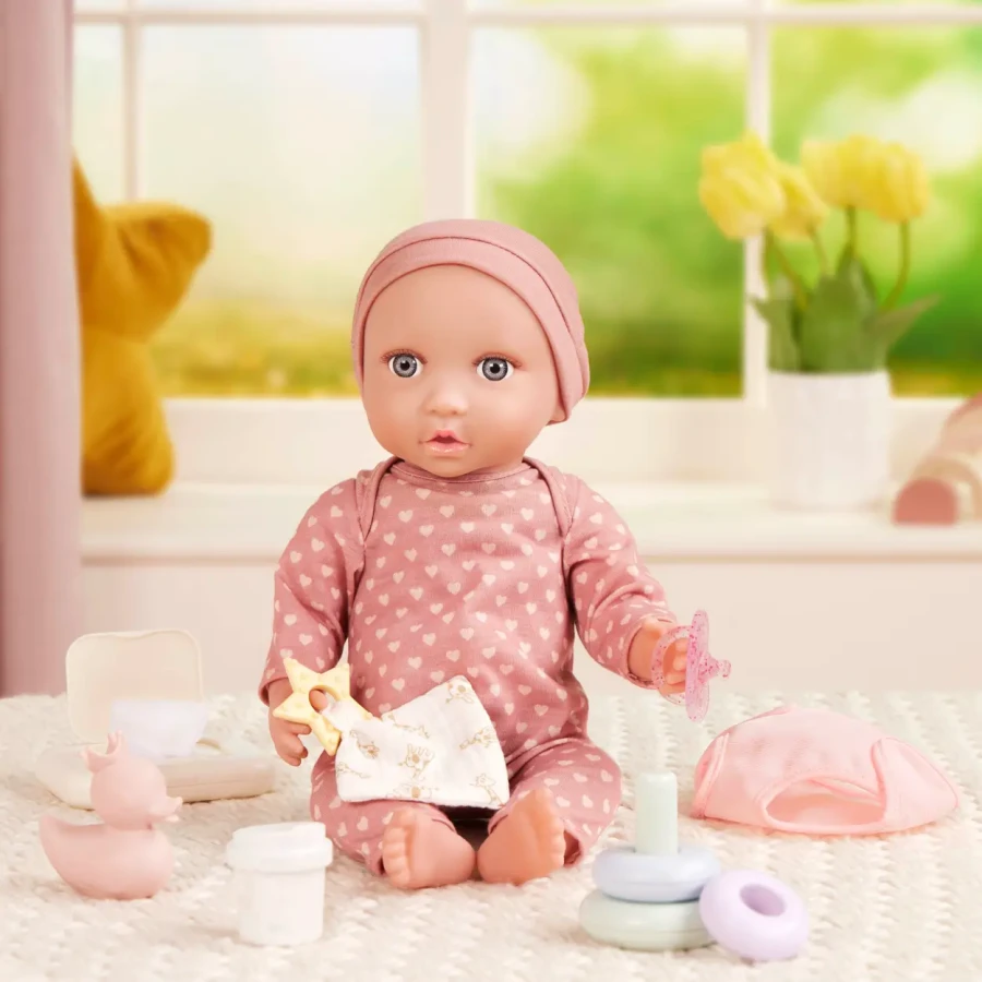 Lalka niemowlę ze smoczkiem, w piżamce w serduszka i czapeczce / LullaBaby